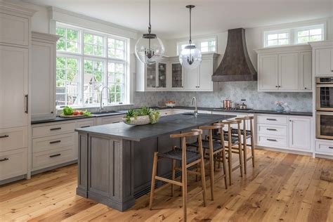 grey kitchen with black countertops